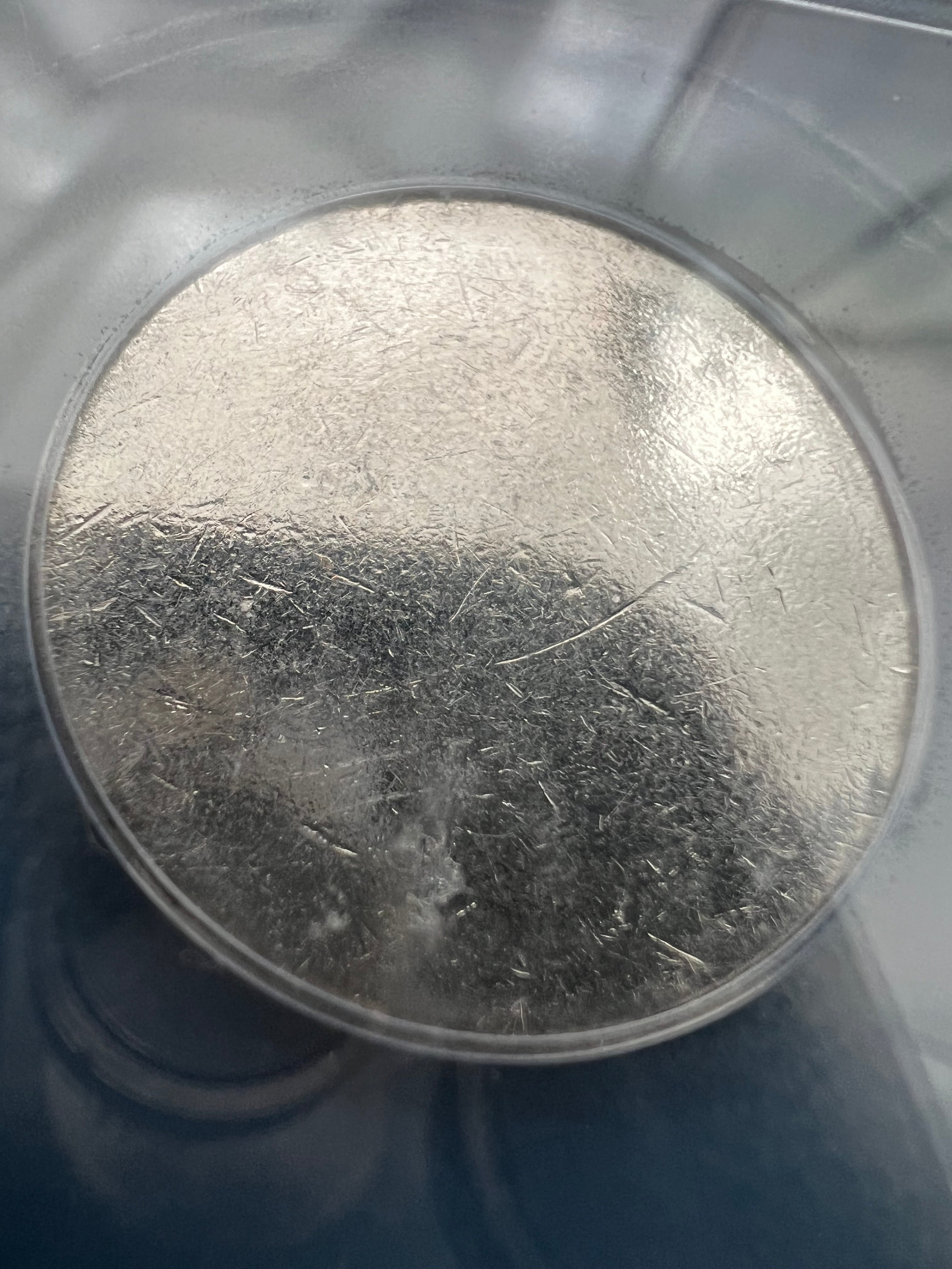 Mint Error Blank Quarter Planchet From The “New Jersey Hoard” ICG